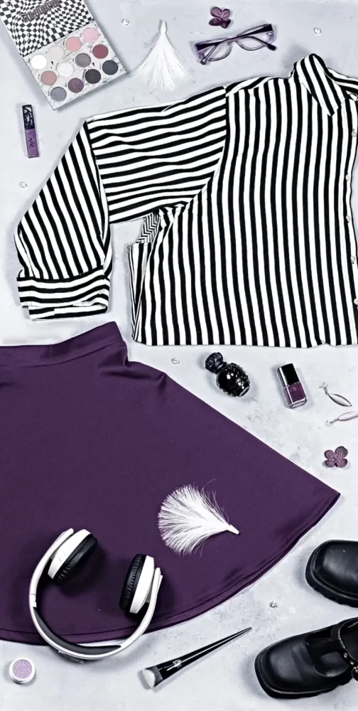 Barbie-inspired fashion, purple skater skirt, black and white blouse, chunky heels