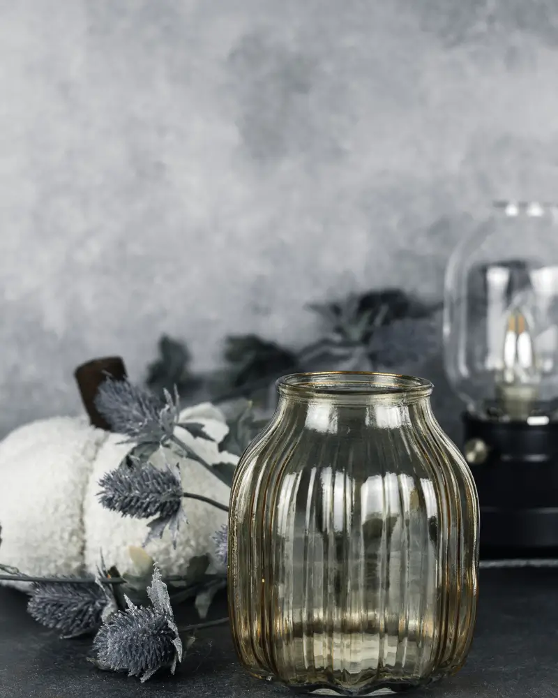 glass jar, pumpkin, fall floral stems, lantern, fall home decor trends for 2023, this geeked out blog