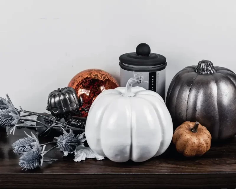 Geeky Fall Decor with faux metal painted pumpkin, jack skellington pumpkin king funko pop and other geeky fall decor